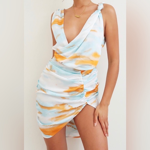 multi tie dye satin plunge wrap ruched bodycon dress PrettyLittleThing - Tie dye dream Our babe @sabrinahall55 in the Multi Tie Dye Satin Plunge Wrap Ruched Bodycon Dress https://bit.ly/2Nklhnm